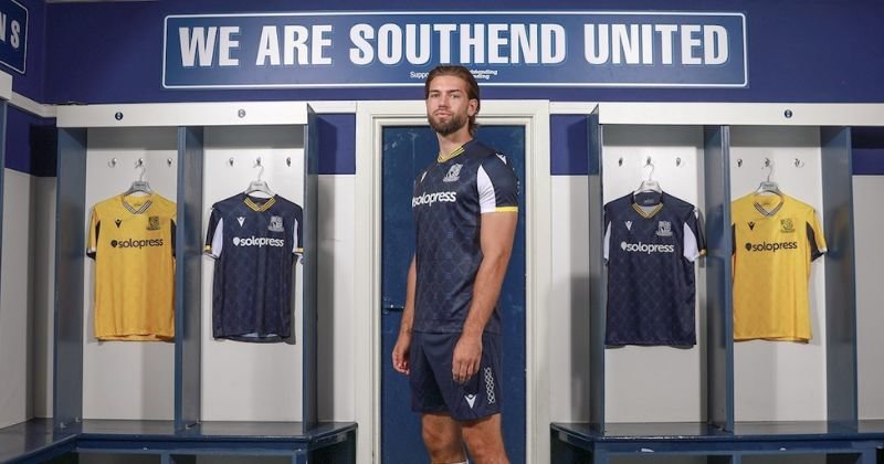 player wearing southend united 2023-24 home shirt in blue
